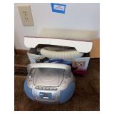 Handheld vacuum cleaner and CD player