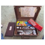 Wooden box with painting supplies