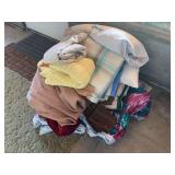 Assortment of pillows and blankets