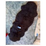 Black sheep skin runner rug