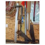 Tools on wall, t squares. Drill template, tools on ledge