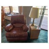 Leather recliner, two matching two drawer end tables and brass table lamp