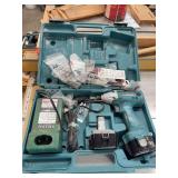 Makita 12V drill, many bits, charger in case