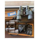Four sets of binoculars