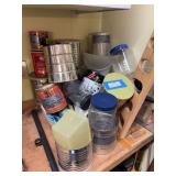 Large quantity of empty coffee cans, and plastic storage containers