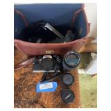 Minolta camera - lots of lenses and case