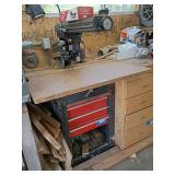 Craftsman 10" radial arm saw on 3 drawer base cabinet