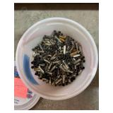 Gallon container over half full of 38 special reloading brass