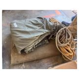 Canvas tarps, ropes, and tent poles