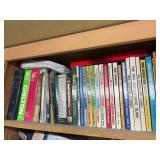 Large assortment of firearm books, woodworking books, carpentry