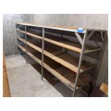 Extremely heavy duty metal frame shelving unit will need to be disassembled to get out. 12’ x 2’ x 5’ tall.
