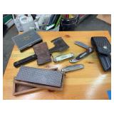 Assorted knives, hatchet, super Kamp kings, broken old timer, sharpening stone