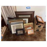 Large assortment of photo frames