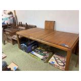 Very large solid oak dining room table 58” inch with two 18” leaves and six chairs