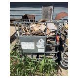 Metal water carrier crate with firewood