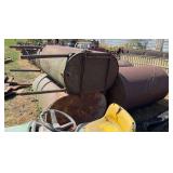 Two fuel oil barrels and two large gas barrels