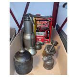 Oil cans as shown