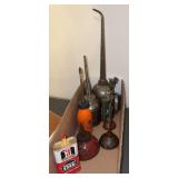Oil cans as shown