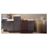 Candle molds and candles as shown, described on boxes