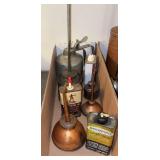 Oil cans as shown