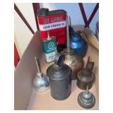 Oil cans as shown