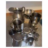 Stainless steel pitchers, trays, etc Used for candle making