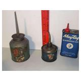 Three Maytag oil cans