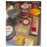 Vintage tins, paper wrapped pencils, etc