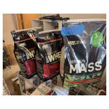 New sealed - Optimum nutrition serious mass strawberry protein powder, and two bags of 100% whey protein