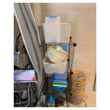 Metal shelf with plastic bins