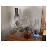 Three oil lamps