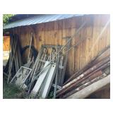 Pickers paradise of metal stock - heavy angle iron, square stock, aluminum angle iron, assortment of locking doors, small pieces of diamond plate, long pieces of square stock