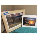Two unframed prints “Bugling Back” by Eddie Leroy and “Quiet Time” by Leo stans