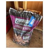 Two bags of wood pellets, cherry rum, and Mesquite blend