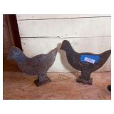 Two cast-iron yard birds