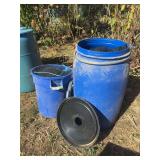 Two poly barrels, full of tree netting