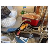 Vacuum cutter roll, cutting board, coffee filters, pans, small cooler