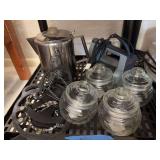 Stainless coffee pot, ice shoe crampons, iron and small jars