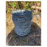 Large roll of barbed wire
