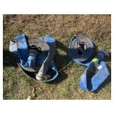 Two 2 inch irrigation hoses - one has both ends attached. The other is a cut portion with only one end.
