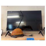 Vizio flatscreen TV no remote and turtle lamp