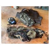 Camouflage clothing, large storage bags, helmet