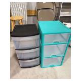Two plastic storage bins