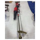 Troy-Built gas weed eater and blower attachment