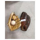 Vintage baseball mitts, balls