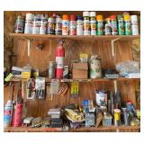 Three shelves above bench contain nut drivers, gloves, glass drill bits, screws, paints of every color and more See photos