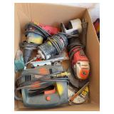 Power tools includes 4-in angle grinder, Black & Decker saber saw, RotoZip style tool, and a drywall screw gun Milwaukee