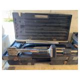 Knee kick carpet stretcher and Roberts Power Lok extra long carpet stretcher with lots and lots of poles for doing a huge room