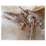 Quantity of pipe wrenches and a 2 lb hammer