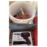 Two and a half gallons of hole saw bits and a Weller solder gun